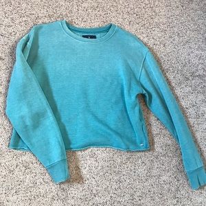Teal cropped distressed raw hem sweatshirt